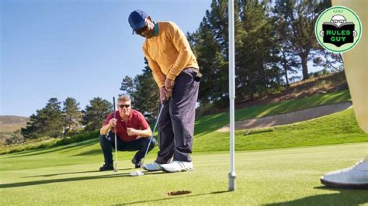 Can you putt without removing your marker?
