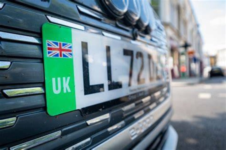 How do I report a cloned number plate to DVLA?