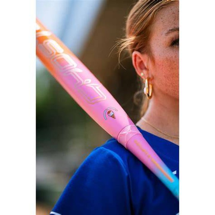 How do you break in a new composite softball bat?