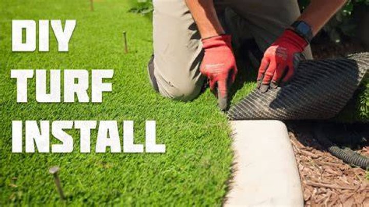 How do you lay artificial grass on a driveway?