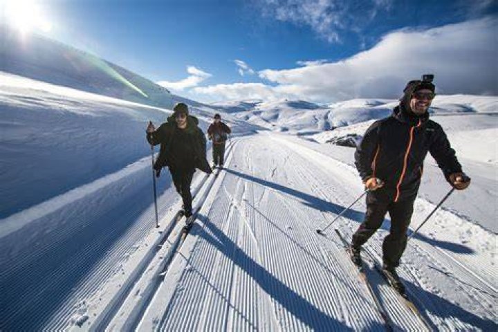 Is cross-country skiing harder than skiing?