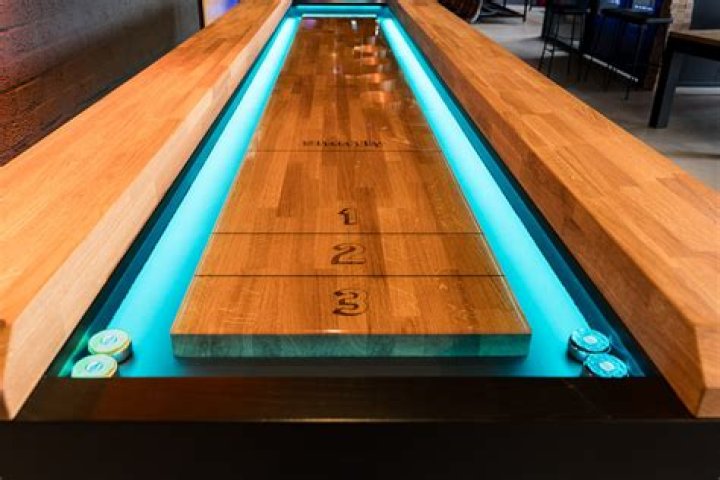 What kind of finish is on a shuffleboard table?