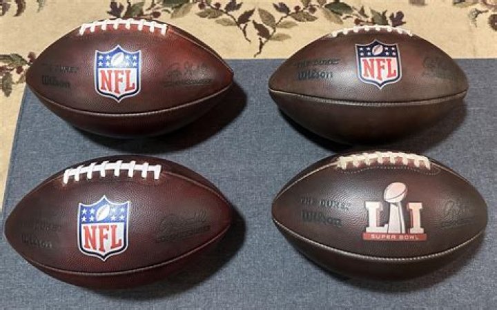 What nickname is on all NFL footballs?