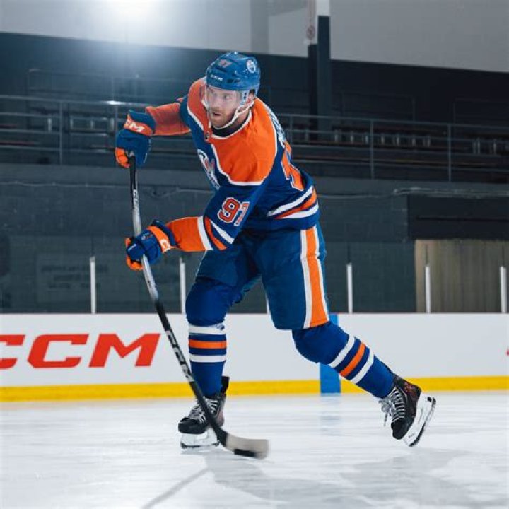 Why can't a hockey player pick up his stick?