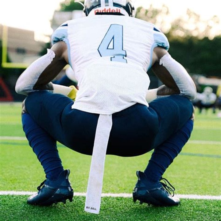 Why do football players wear towels in their pants?