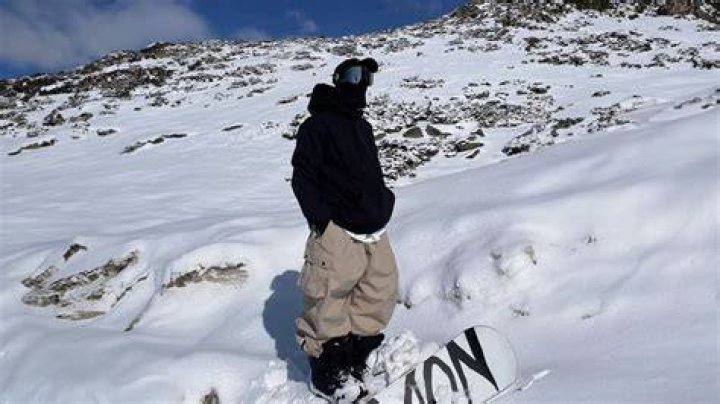 Why do snowboarders wear their pants so low?