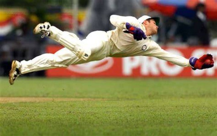 Why is there a helmet behind the wicket-keeper?